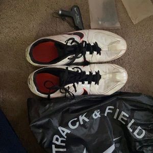 Men’s Nike track and field cleats with removable spikes. Size 9.5